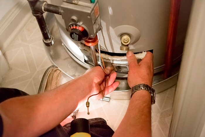 Installation and maintenance of a water heater to save money